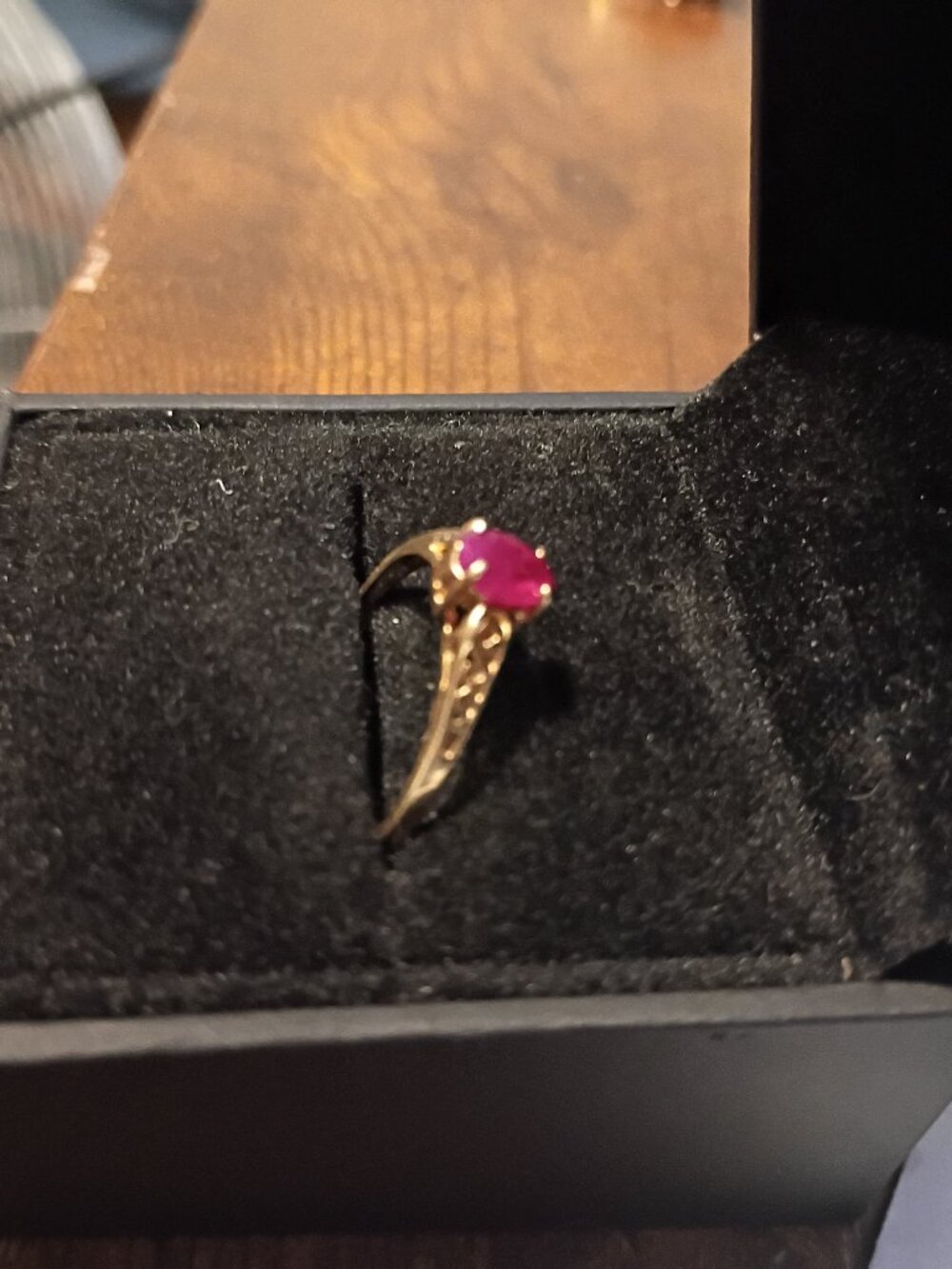 12 karat gold ring with a oval cut ruby just appraised